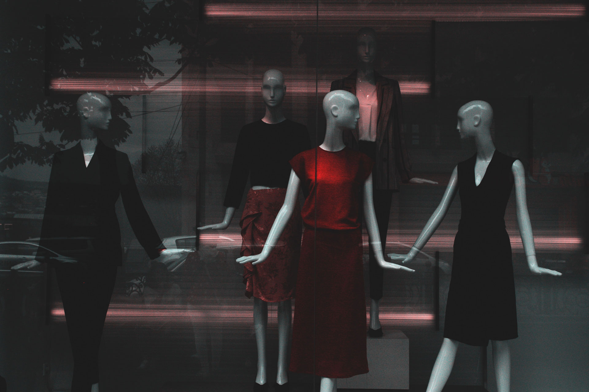 An image of designer clothes on some mannequins